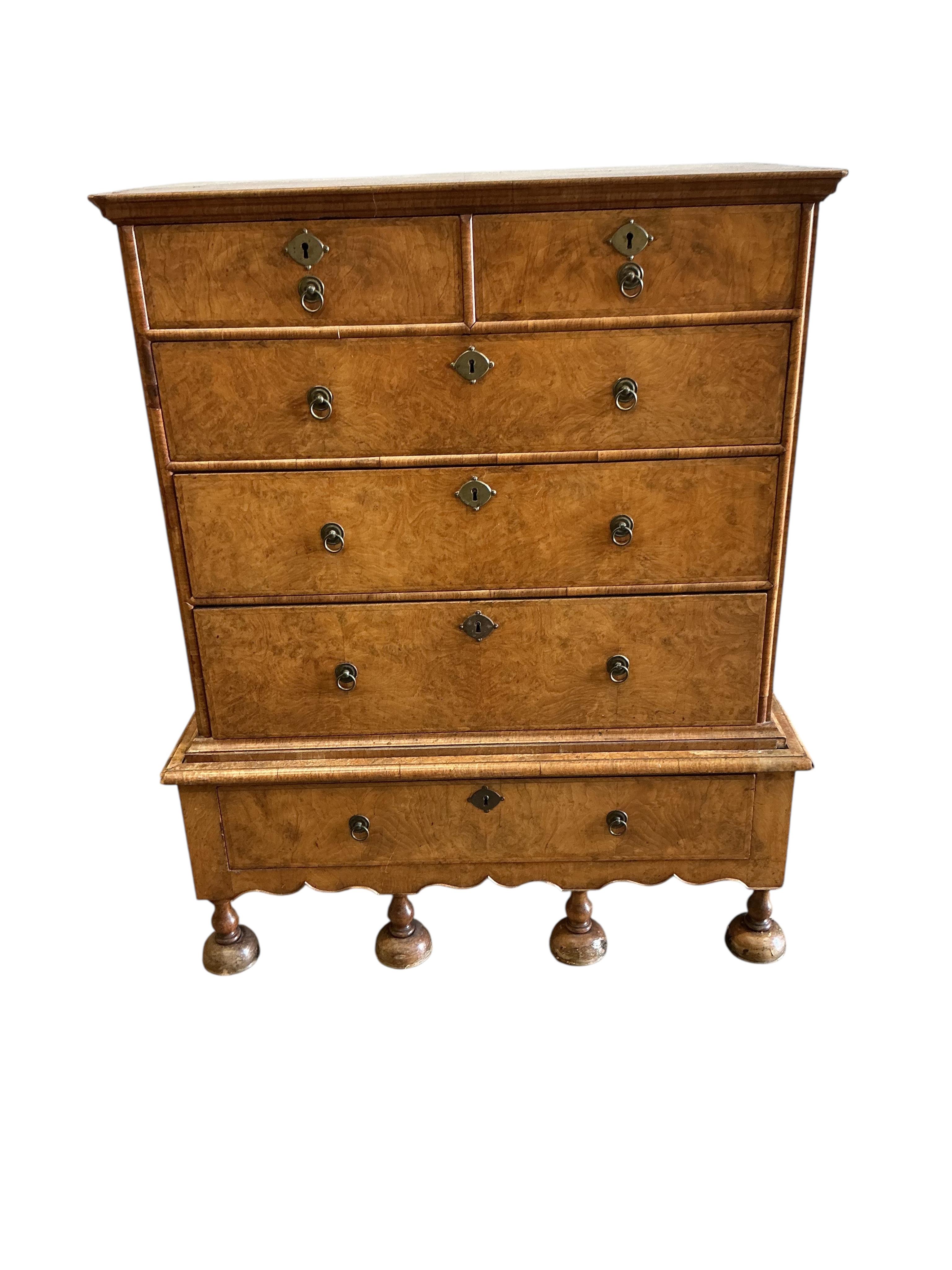 An 18th century style walnut chest on stand, width 108cm, depth 62cm, height 132cm